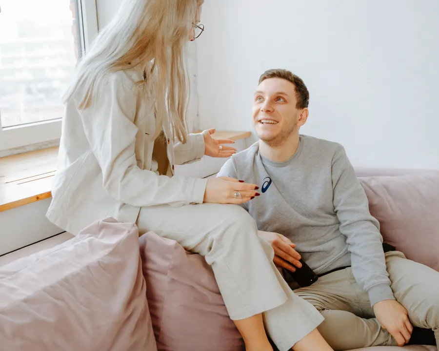 A couple in conversation at home